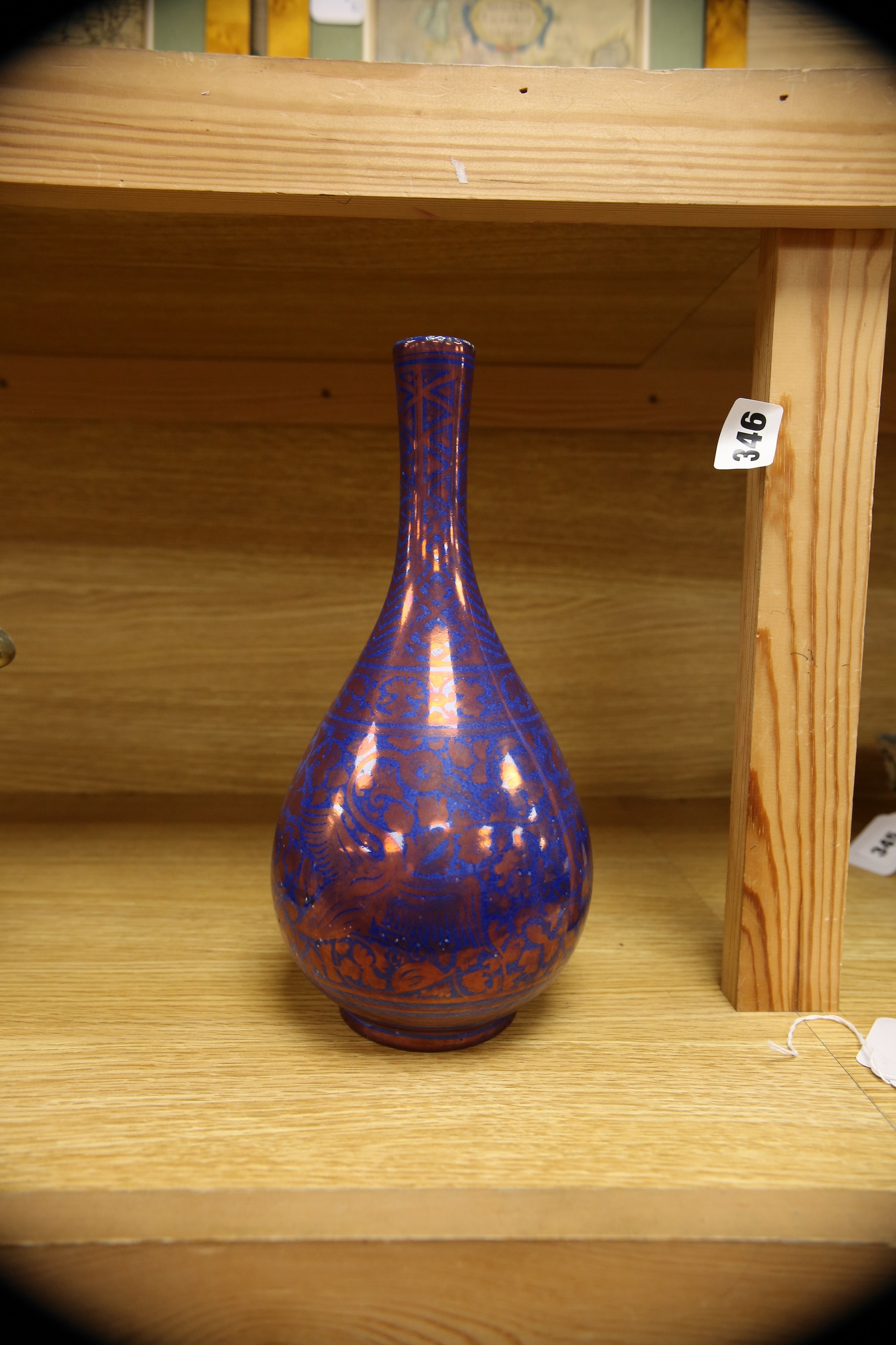 A Gallo, Italy copper lustre bottle vase, copy of a Safavid design, 27cm. Condition - good